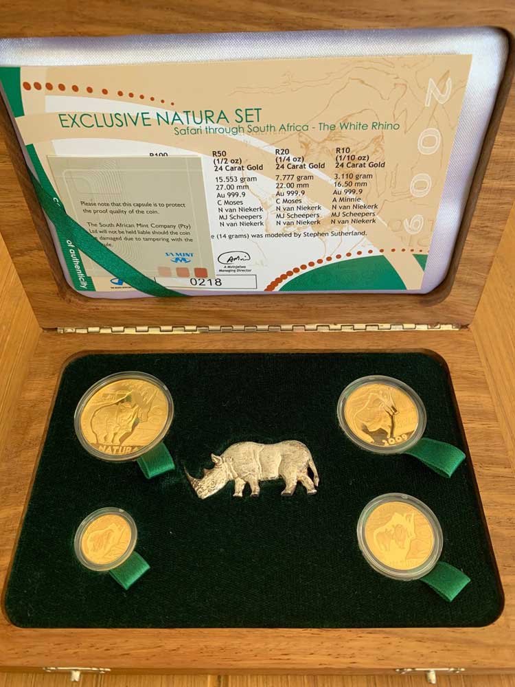 2009 exclusive white rhino gold proof natura set rotated.jpg